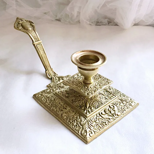 Bougeoir à main bronze doré style Empire XIXe